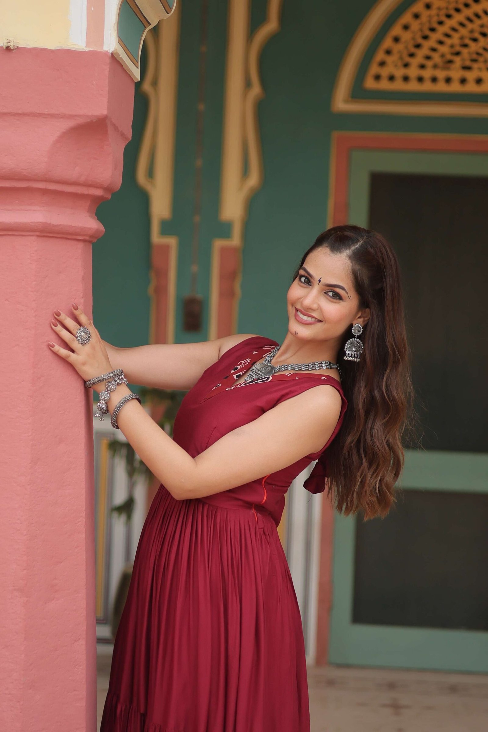 Maroon Designer Heavy Reyon Gown with Printed Frill & Fancy V-Neck - Image 3